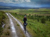 Cyclist on the original Road to the Isles  - part of the West Coast Cycle Trail